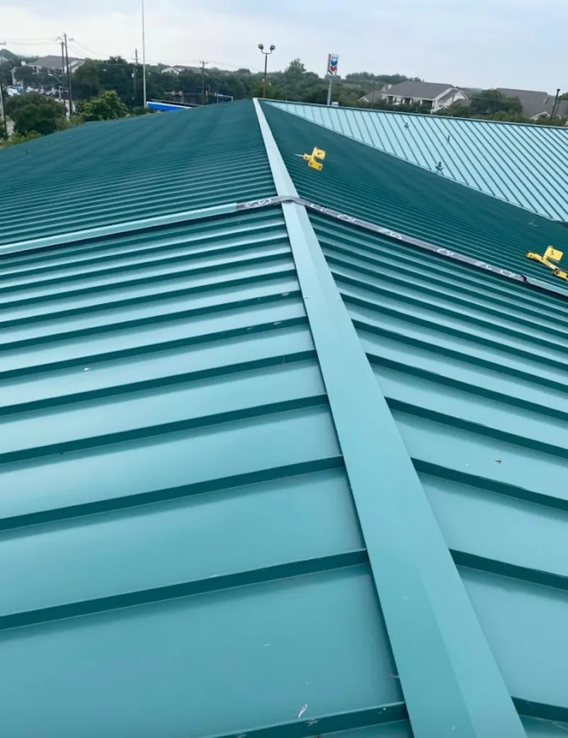 Green commercial metal roof ridge and valley for Metal Roof Repair in Woodward