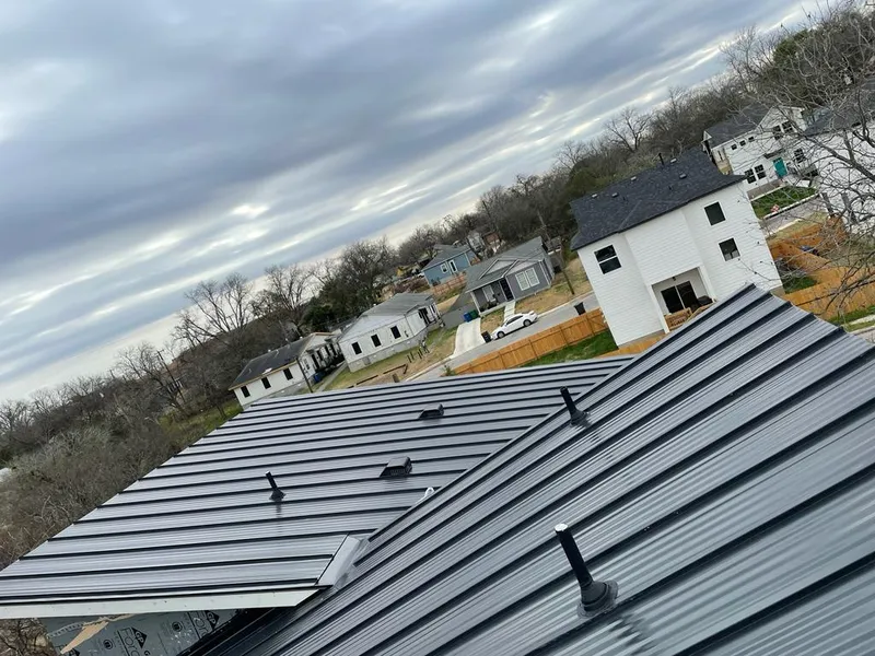Standing seam metal roof panels with vents for Skylight Repair in Woodward